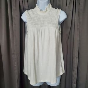 Pleione Women's White sleeveless blouse with smocking at chest. Size Medium